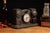 c. 1900s; Darche Manufacturing Co. - Chicago Antique combination alarm clock-bank-safety deposit-flashlight, giving any...