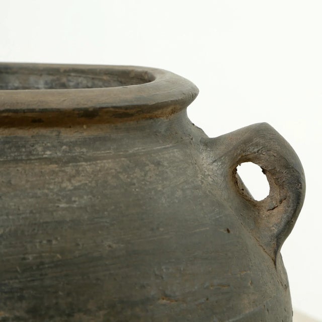 Introducing the Vintage Gray Ceramic 10" Water Vase with a unique touch of history. Originating from Northern China's...