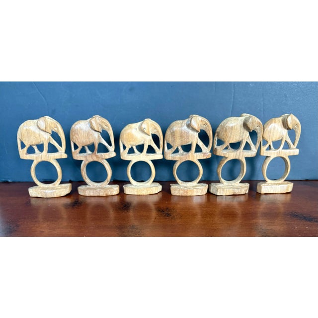 These are a beautiful set of elephant napkin rings, hand carved in Africa. They are approximately 4 inches tall. I do...