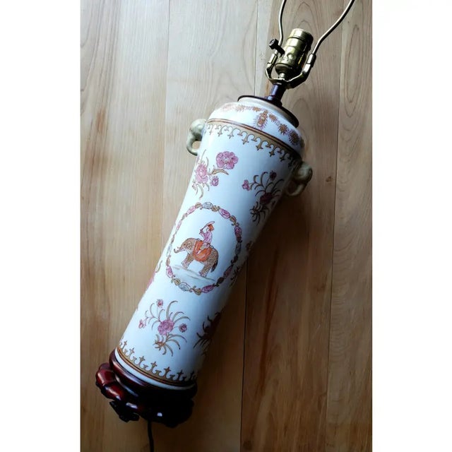 An impressive, rare mid-20th-century Chinese export porcelain statement lamp base in the traditional Rose Medallion style....