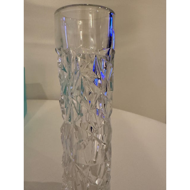 Set of 6 Tiffany Crystal Bud Vases in original box. Perfect condition, never used. The vases are 8 inches tall and 2...