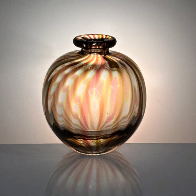 This high quality studio glass art vase was designed and hand-crafted by the renown Danish glass artist Tchai Munch. She...