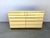 Beautiful cream lacquer and brass chest of drawers by Jean Claude Mahey The chest of drawers is made of high quality...