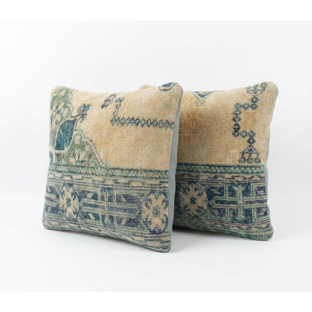 This beautiful 20'' x 20'' pillow cover set was made from authentic Turkish rug pieces. Bright colors of wool adorn the...