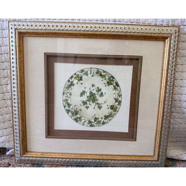 A beautifully coordinated pair of framed botanical still-life prints by celebrated American artist Carolyn Shores Wright,...