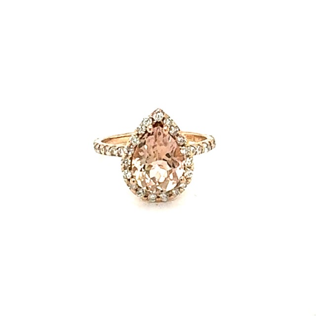 3.24 Carat Morganite Diamond Rose Gold Engagement Ring This gorgeous and classy Morganite Ring has a 2.61 Carat Pear Cut...