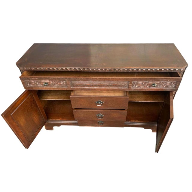 Nothing is quite like Romweber Viking Oak furniture. This fine sideboard or credenza was made circa 1950 in Batesville,...