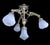 French 19th Century bronze four-light antique chandelier, neo gothic style, gryphons, mascarons, gargoyles. This antique...