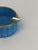 A turquoise opaline glass ashtray attributed to Vincenzo Nason, made in Italy during the 1950s, featuring a circular form...