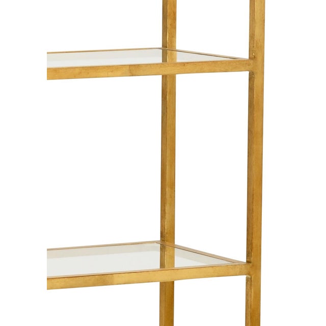 Clancy Etagere is perfect for adding height to your space while displaying your favorite decorative accessories. This iron...