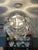 This light fixture is the Luceplan Hope Pendant Light, a modern interpretation of the traditional crystal chandelier....