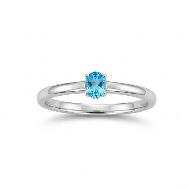 Professional Jewelry Description This elegant solitaire ring features a serene blue gemstone set in a sleek and polished...