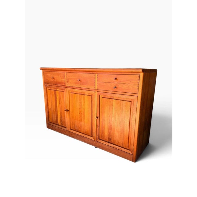 Here is a mid-century Scandinavian sideboard credenza, made in Denmark and attributed to the Danish design duo Søren...