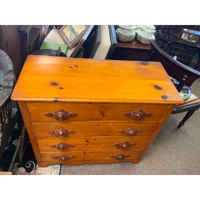 Late 19th century beautiful Victorian Pine chest with detailed carved pulls. Scalloped bottom front detail, dovetail...