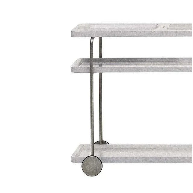 White cocktail serving bar trolley chromed finish materials: iron, plastic dimensions: d 43 cm x w 91 cm x h 73 cm....