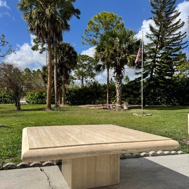 A sculptural vintage coffee table crafted in Italy by Stone International, featuring beautifully veined natural...