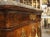 Topped by a one-inch thick marble top, this commode has a beautiful mahogany veneer with flame graining and foliate and...