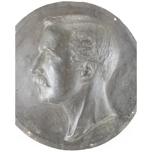 We are selling this heavy bronze plaque of a man. This portrait profile bust is of a mustachioed gentleman. The bronze is...