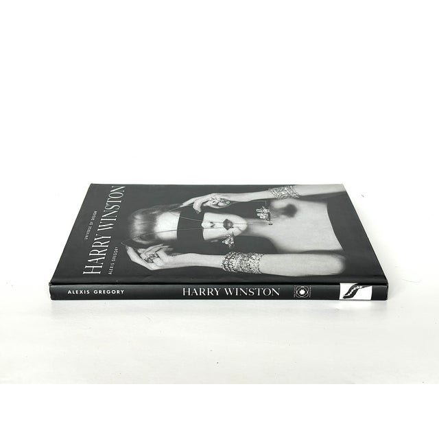 Filled with artful photographs of exquisite Harry Winston jewelry, this vintage book provides an overview of the company's...