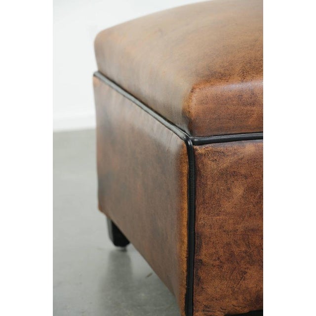 Brown Sheepskin Ottoman with Black Piping For Sale - Image 8 of 9