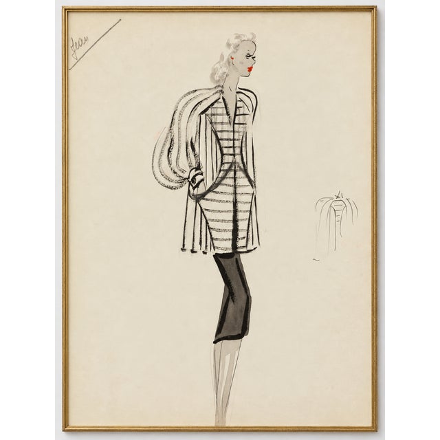 A woman wearing a white coat with bold black stripes over a sleek black dress brings Parisian elegance to this vintage...