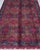 Forest green is an unusual ground color for an Afghan Turkmen rug — most collectors see it and stop. The field of this...
