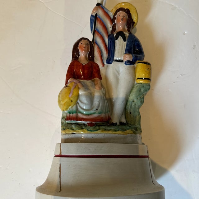 Pair of charming Staffordshire lamps of a sailor and his sweetheart. 20th century in working condition. Perfect lamps for...