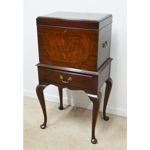 Silver Chest by Henkel Harris. Store item #552. It features queen ann legs, inlaid wood and brass hardware.