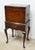 Silver Chest by Henkel Harris. Store item #552. It features queen ann legs, inlaid wood and brass hardware.