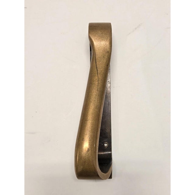 Alvar Aalto's door handle, material bronze, manufactured by Valaistustyö. In great used condition with beautiful bronze...