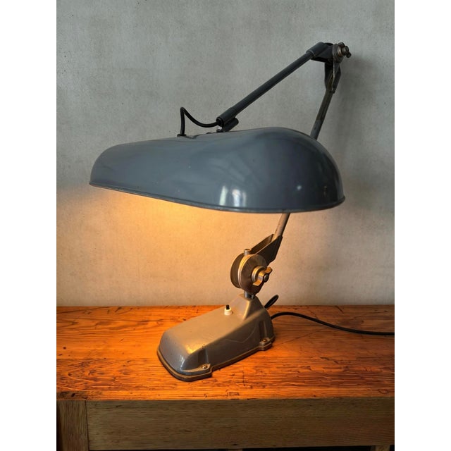 Large 1960s task lamp by German lighting manufacturer Rademacher GmbH. The company was established in 1914 by Ernst...