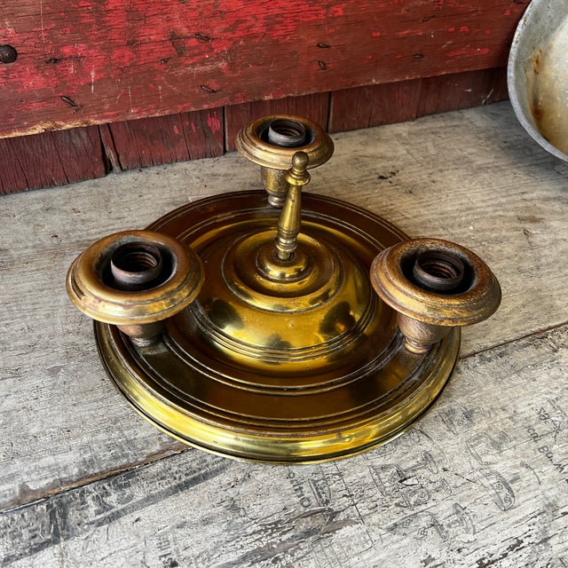 This vintage brass chandelier base/flush mount ceiling fixture showcases timeless craftsmanship with its three-arm design...