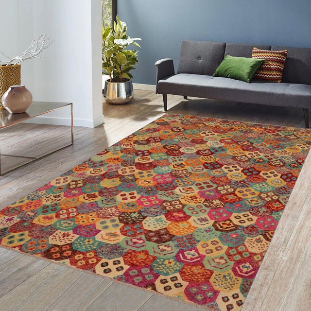 This stunning hand-knotted Afghan Balouchi rug is a captivating addition to any decor. Crafted by skilled artisans, it...
