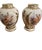 Pair of Putti Vases from Königliche Porzellan-Manufaktur (KPM). Featuring motifs of putti, floral decorations, and...