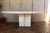 Exceptional Italian Postmodern dining table by Stone International, crafted entirely from beautiful beige travertine...