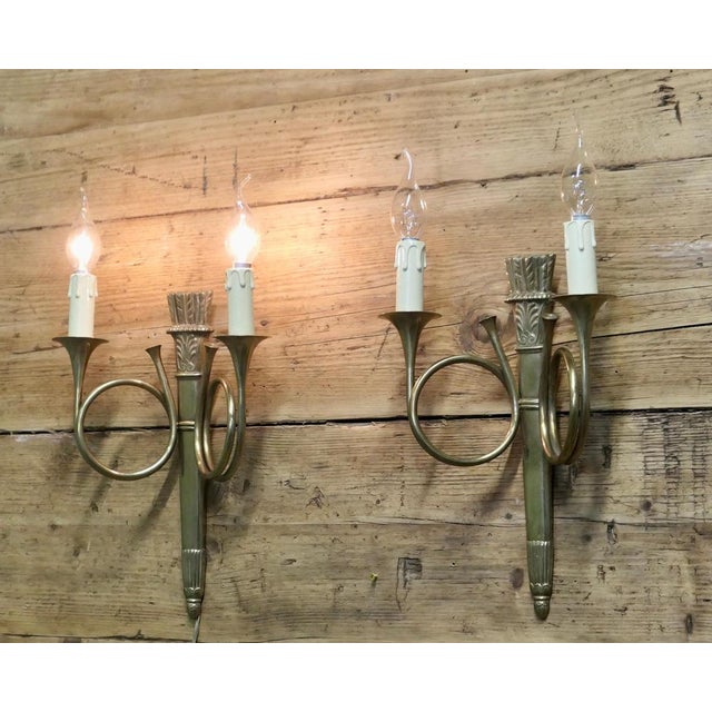French Art Deco Twin Wall Lights, Hunting Design These charming pieces are made in brass they each have 2 branches in the...