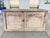 This antique Swedish credenza was hand-crafted in the 19th Century from elm wood. The elegance of the woodwork, with its...