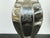 A pair of silver plated table lamps from the mid 20th century, with Bious-et-Augax armorial crest. Created in England...