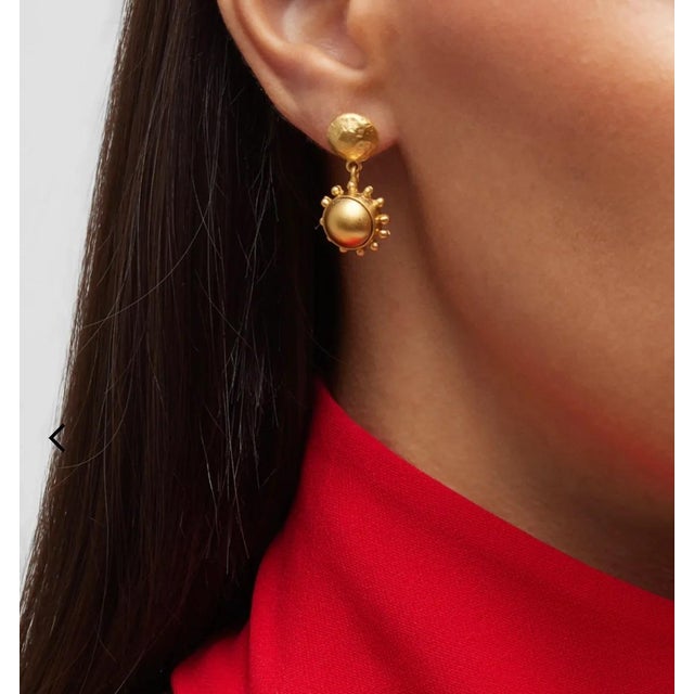 We love these new gold accent earring based around our classic "pinwheel" style earring. Post earrings are for pierced...