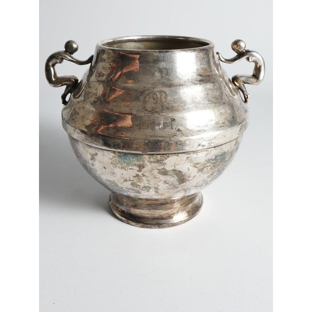 A captivating and highly sculptural mid-century silver-plated vessel (marked prima n.s.), complete with its original clear...