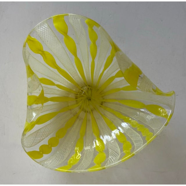 Here is a beautiful Murano hand blown art glass bowl, made in Italy in the mid-20th century, likely 1950s. It features a...