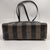 This authentic 1990s vintage Fendi shoulder bag is a striking example of the house's heritage, featuring the iconic Pequin...