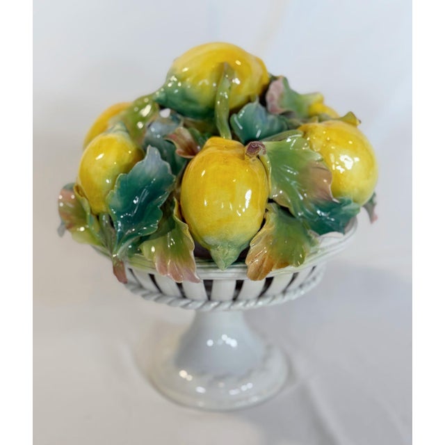 This is a charming vintage Italian majolica topiary featuring an arrangement of hand-painted lemons and oversized foliage...