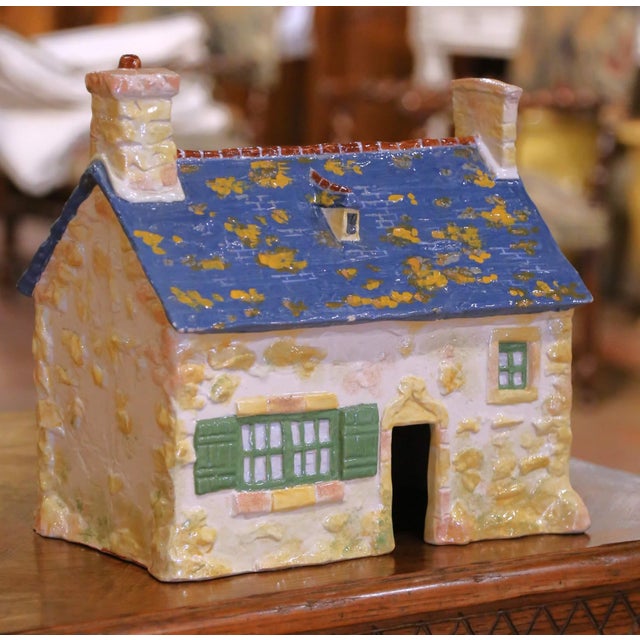 Decorate a shelf, console, or kitchen display with this charming sculptural faience house, crafted in Brittany by the...