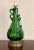 Murano blown glass lamp base in green with a cream lamp shade. The lamp has a total height of 34 inches, a base height of...