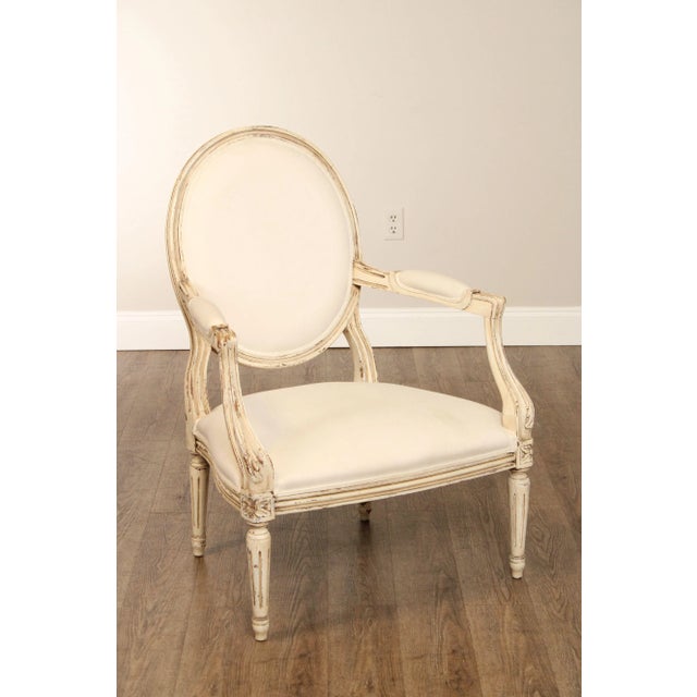 High Quality French Inspired Oval Back Open Arm Accent Chair with Carved, Painted and Distressed Wooden Frame With White...