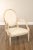 High Quality French Inspired Oval Back Open Arm Accent Chair with Carved, Painted and Distressed Wooden Frame With White...