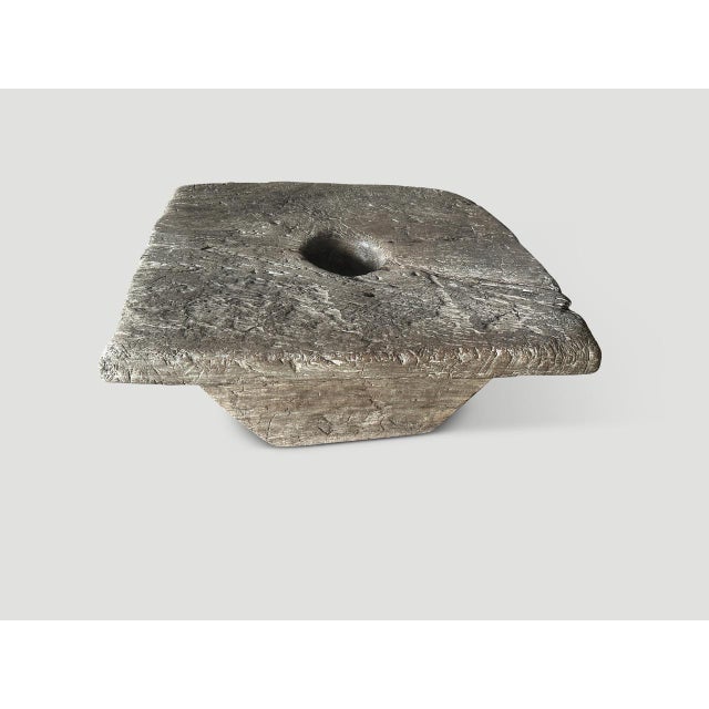 Impressive century year old mortar originally used to grind rice in the center. Both usable and a piece of art. Carved...