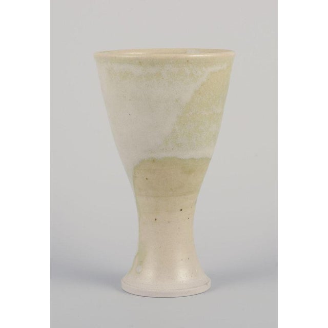 Swedish ceramist. Unique ceramic mug. Glaze in light tones. Late 20th century. Signed: Johanna på vik. Perfect condition...