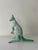 A hand painted porcelain figurine from Herend Hungary. The piece is titled Kangaroo and Baby and depicts a mother kangaroo...